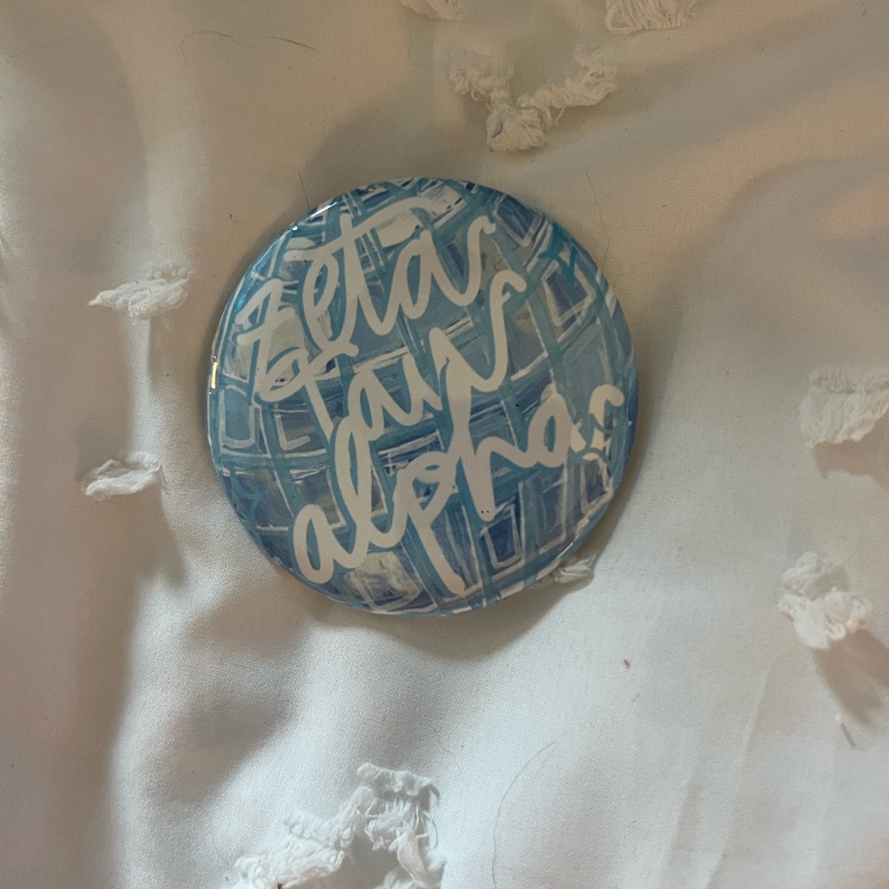 two ZTA gameday pins
